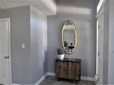 Additional view of the foyer.