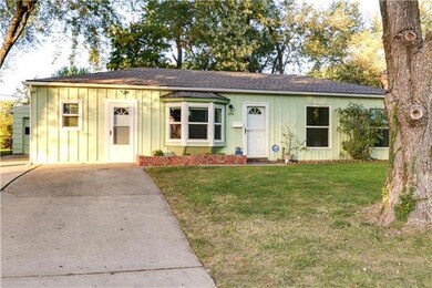 Front of home showing converted garage.