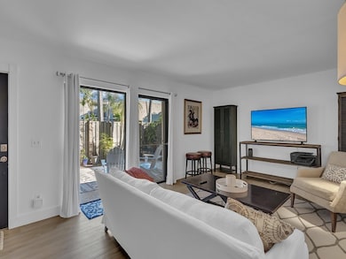 Sliders out to Patio from Living Room Area