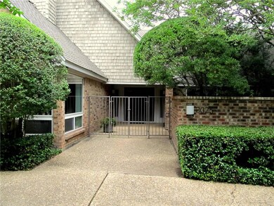 Beautiful gated front entry welcomes you into this