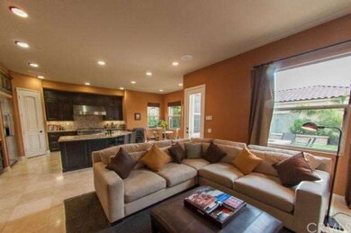 The great room with kitchen, breakfast nook, and c