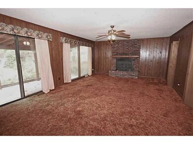 Huge Den on the back of the house has fireplace, l
