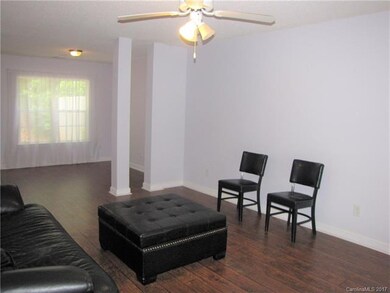 New laminate wood flooring in greatroom and dining