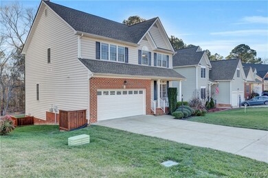 View of front facade featuring a garage and a fron