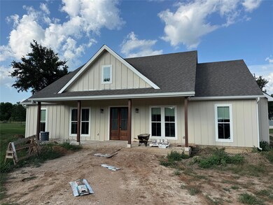 View of front of home featuring french doors, boa
