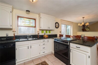 A spacious eat-in kitchen with...