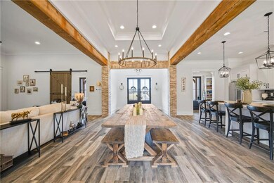 Dining space with hardwood / wood-style flooring, 
