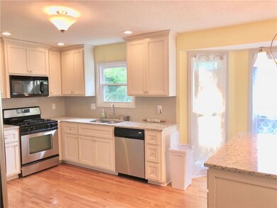 New Kitchen cabinets-new granite-new light fixture