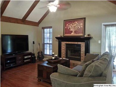 Great Room with gas log fireplace.