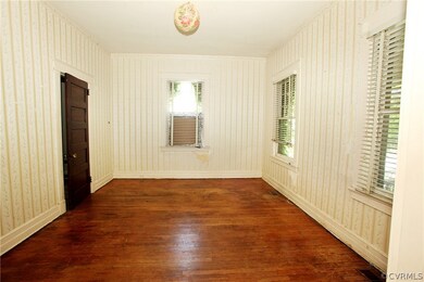 The Parlor (wall paper not wood paneling is what we are seeing in the LR and Parlor)