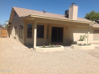 Back of House w Covered Patio