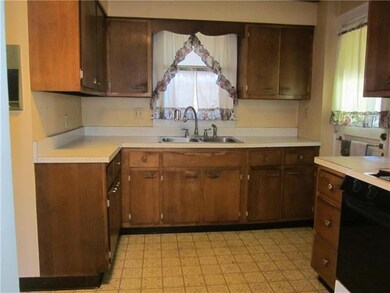 Kitchen has access to back yard