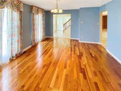 The dining room has beautiful hardwood floors.
