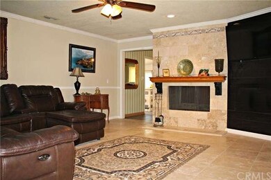 Open living room with double sided fireplace, open