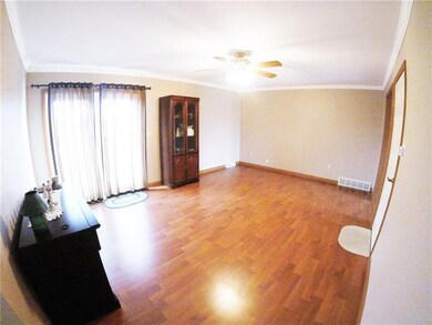 Sliding glass doors lead to the expansive back dec