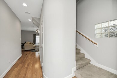 As you enter straight ahead is the living room. St
