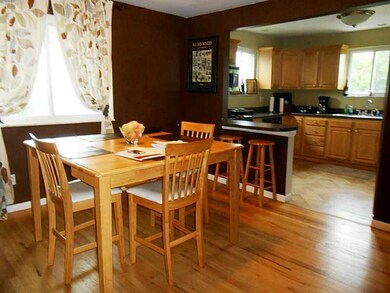 Dining Room. The gleaming Hardwood floor continues
