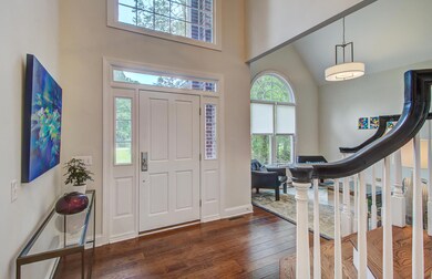 Two-story entrance w sitting room