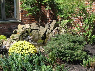 Exterior Front Pond / Waterfall