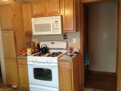 Kitchen - another view shows gas range/oven, micro