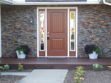 GORGEOUS FRONT DECK AND NEWER DOOR SURROUNDED BY S