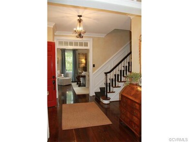 Center Hall Foyer with random width heart of pine 