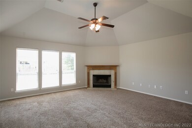 Generous Family Room with wood burning fireplace,