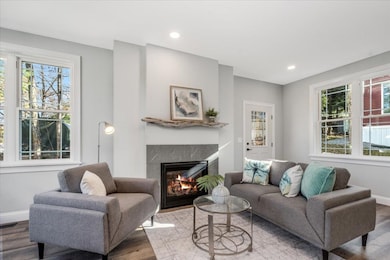 Soaring ceilings and large 3 pane windows keep the space light and bright and open.
