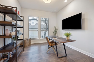 Office featuring recessed lighting, visible vents