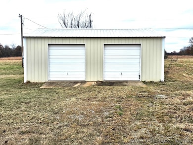 10285 Warren Rd, Henryetta, OK 74437 - photo 5