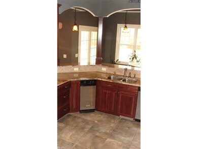 Breakfast bar in kitchen with columns crafted from