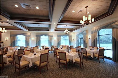 Building lobby with recessed lighting, coffered ceiling, and beam ceiling