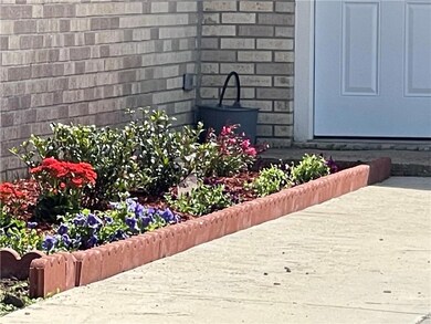 Just move right in......we planted the pretty flowers for you already.