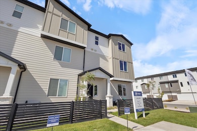 Back of property with a residential view and board and batten siding