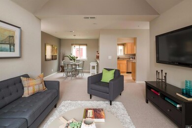 Living room looking toward kitchen with dining roo