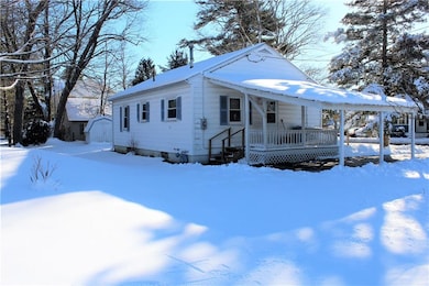 Carport and deck off kitchen entry, and rear of ho
