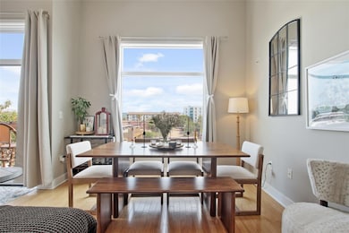 Dining room with light wood-style flooring