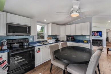 11591 Stringfellow Rd, Bokeelia, FL 33922 - photo 7