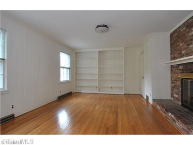 Den/Family/Great Room. Den has gas log fireplace.