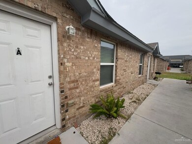 View of front of property with a carport