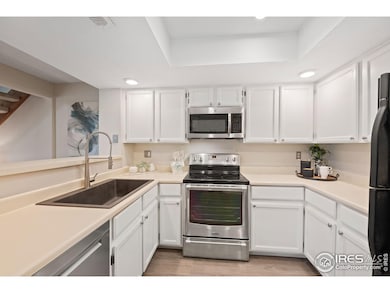 Freshly painted cabinets, nice counterspace, recessed lighting