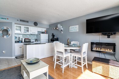 Dining space with light hardwood / wood-style floo