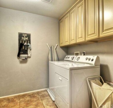 Laundry room with upgraded cabinets