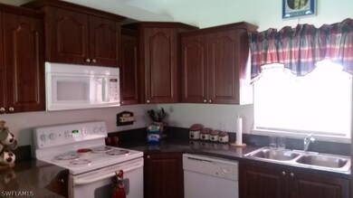 736 Naples Ave S, Lehigh Acres, FL 33974 - photo 4