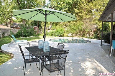 Extended decking around the covered patio