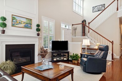 LIVING ROOM W/ VAULTED 2 STORY CEILING
