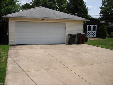 3 Car Garage Extra Deep with side Door.