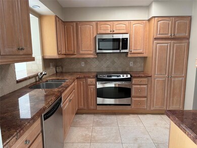 spacious kitchen with stainless steel appliances