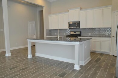 Another view of the well equiped kitchen
