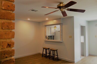 Dining room features breakfast bar.